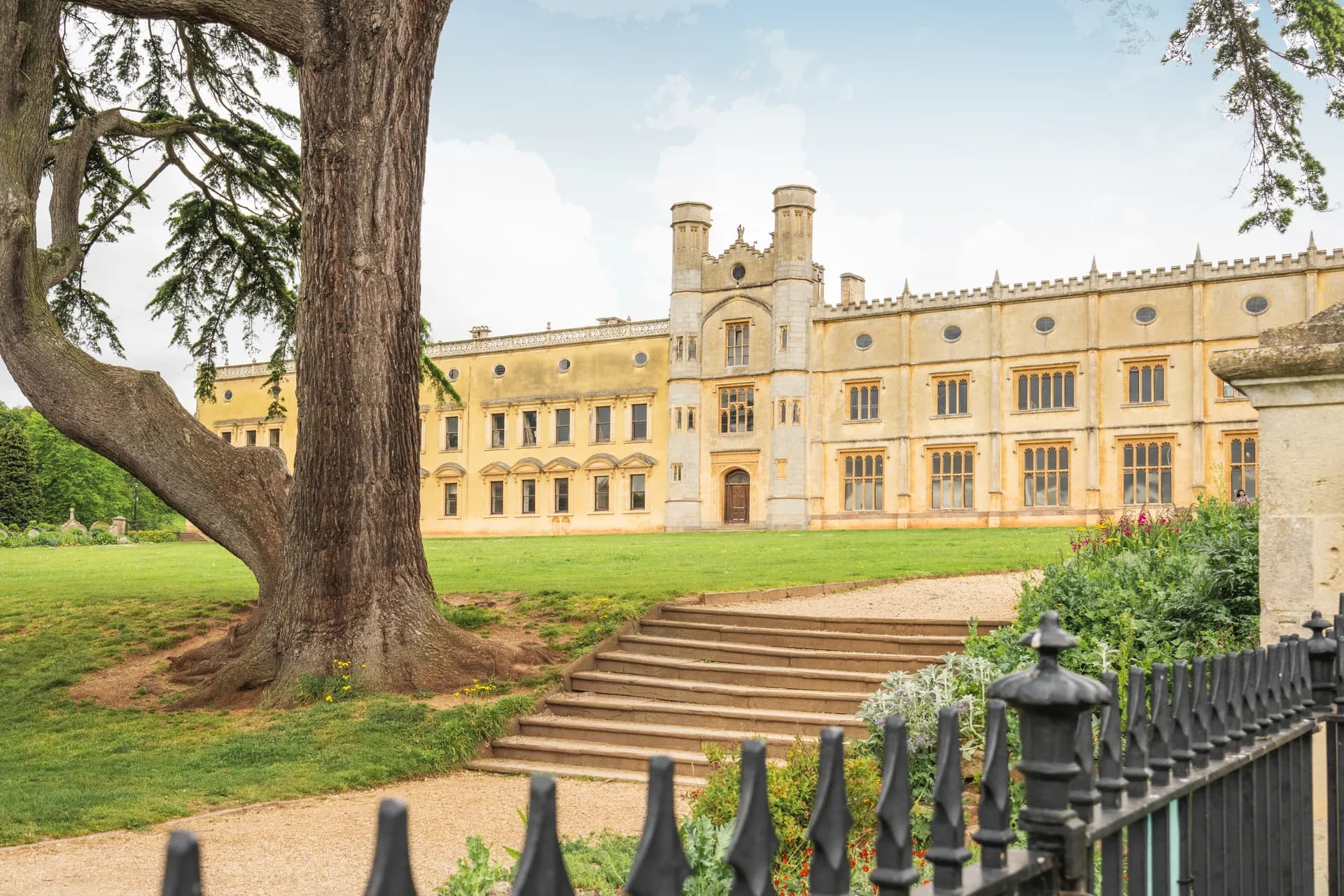 The south front of Ashton Court Mansion from the lawn, with the cedar and the steps