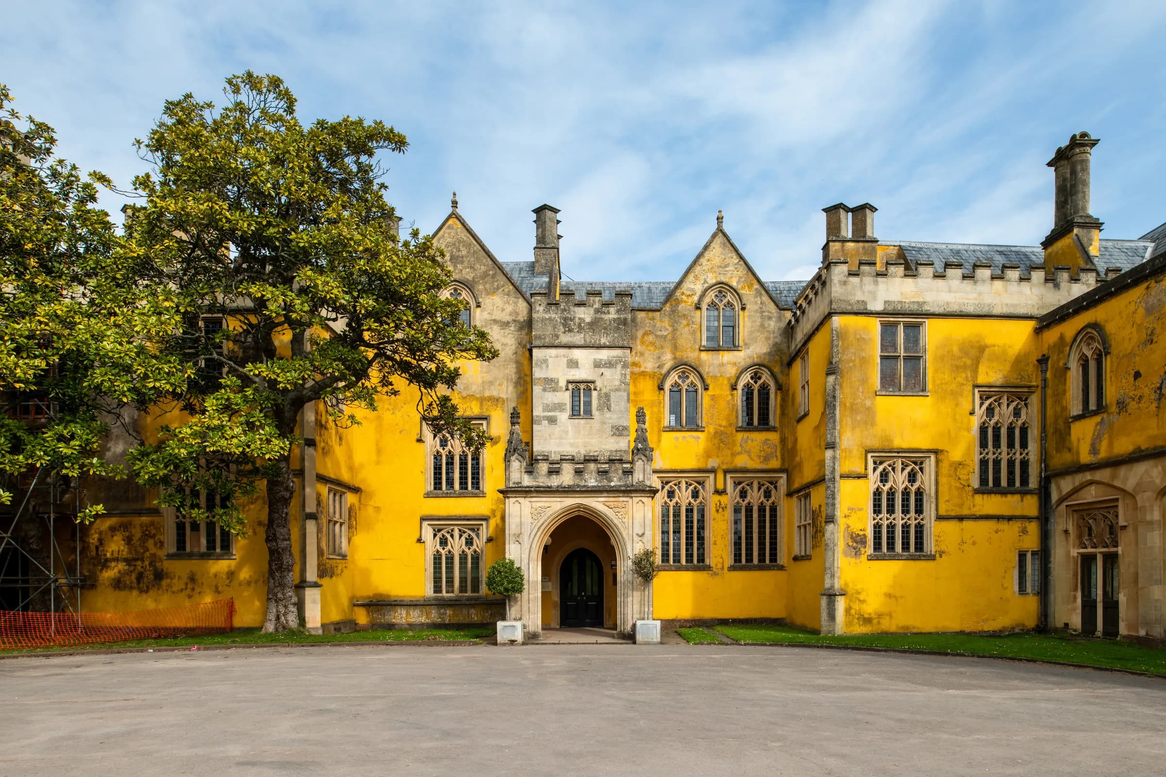 The Gothic front of Ashton Court Mansion on a sunny day